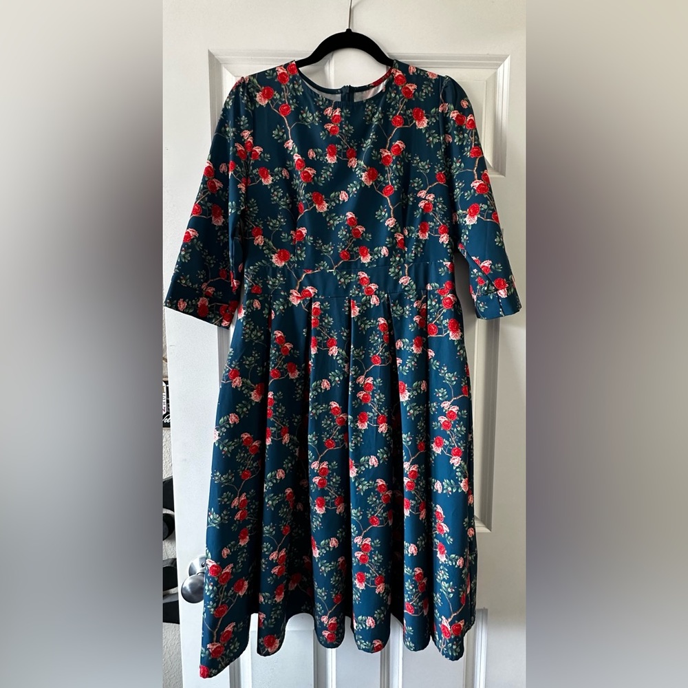 Handmade dress. Zip in back. 3/4 sleeve.